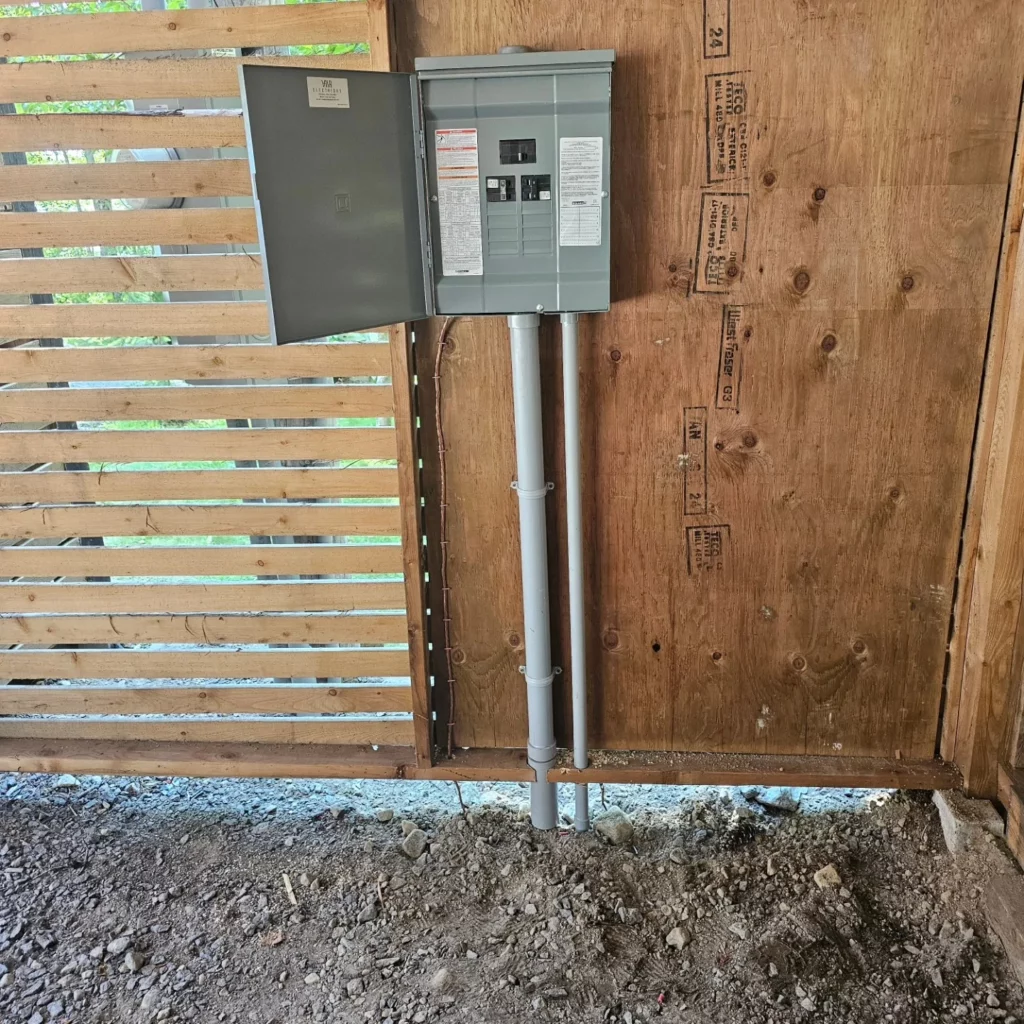 Sub-panel added to feed two EV chargers at a chalet