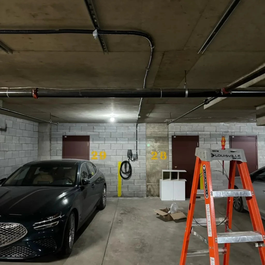 Conduit run in a condo parking garage for an EV charger
