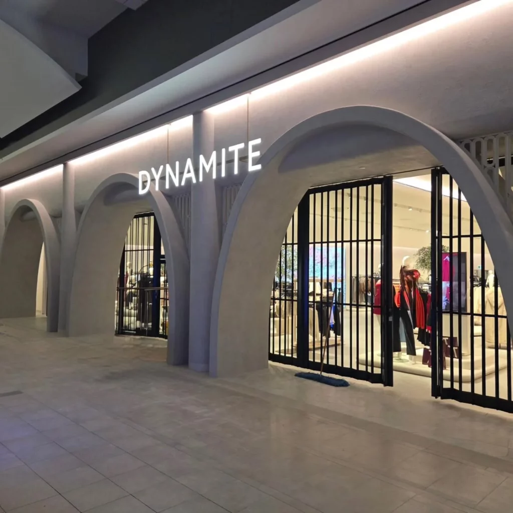 Dynamite storefront at Carrefour Laval with illuminated signage