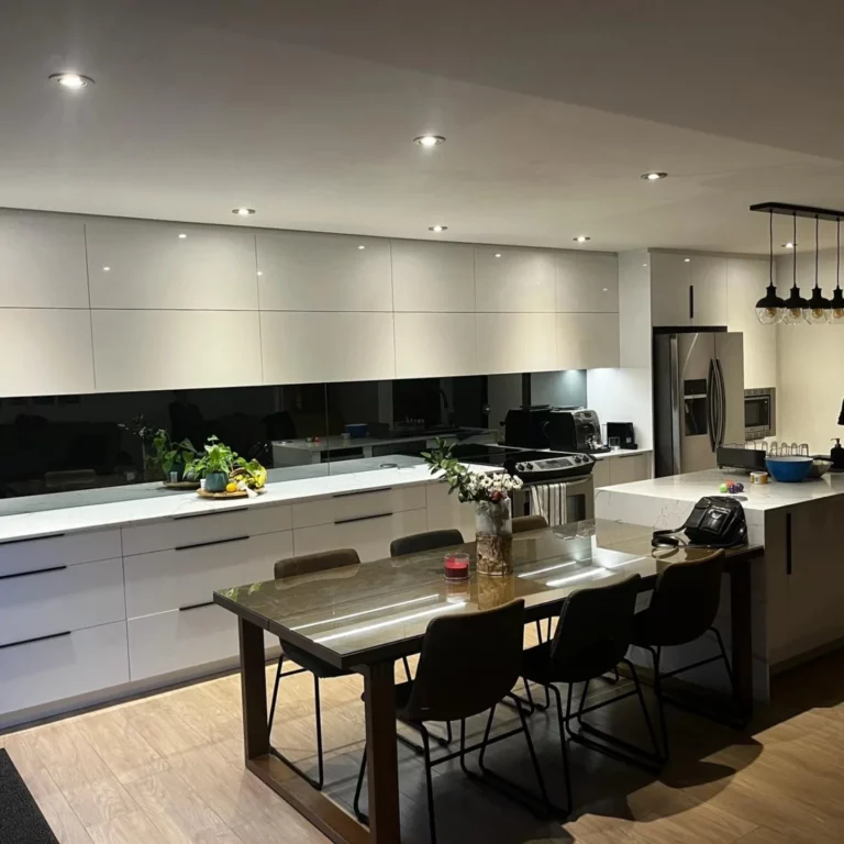 Renovated kitchen with recessed lighting and under-cabinet LEDs