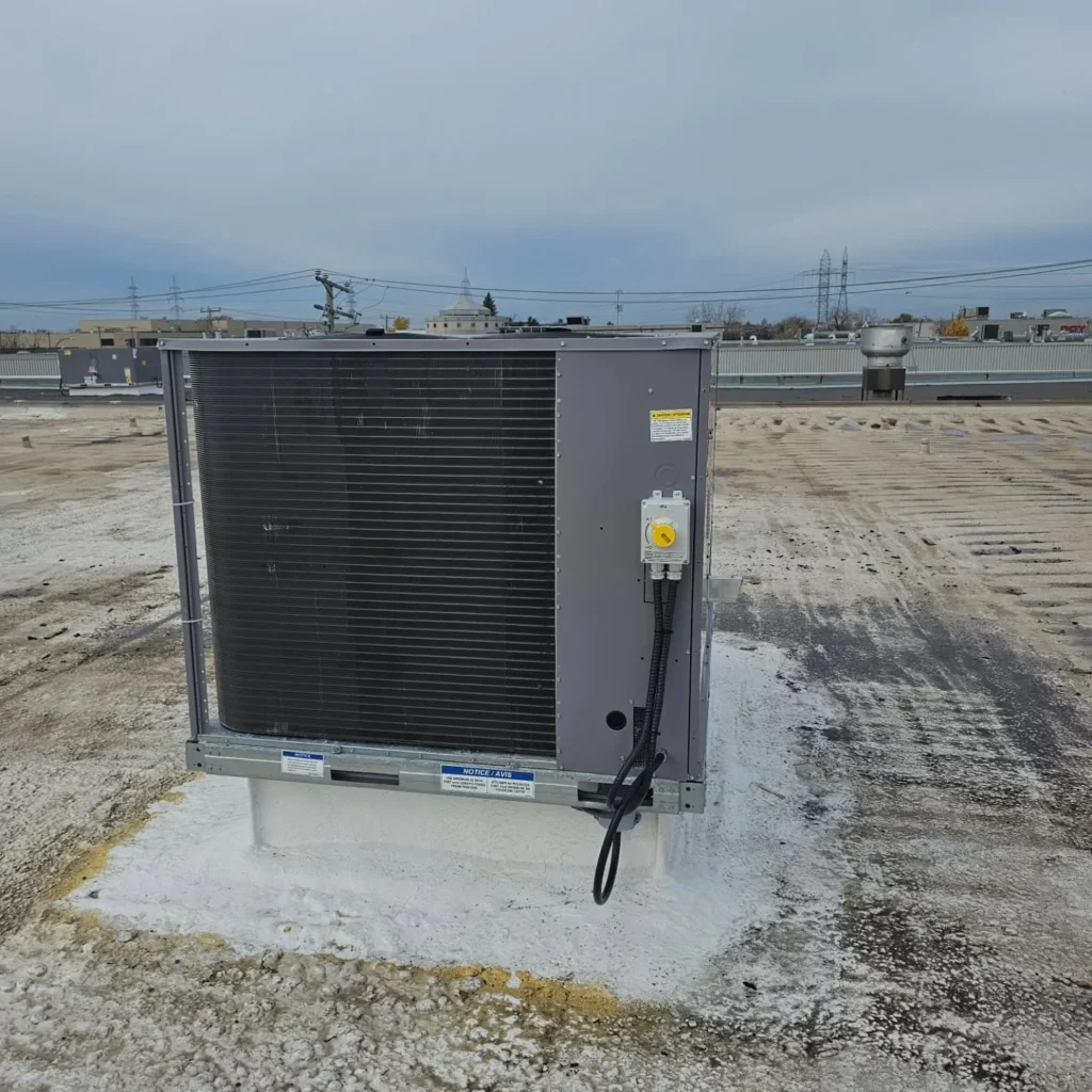 New rooftop heat pump connected and ready for winter