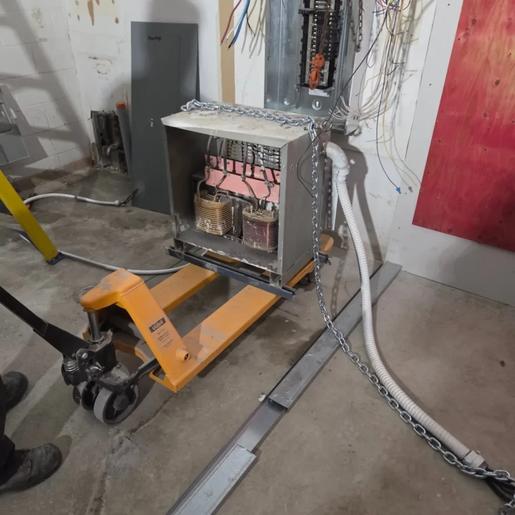 Transformer being relocated during a Saturday shutdown