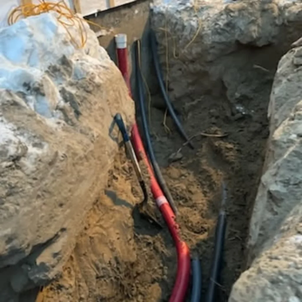 Underground electrical service cables in the trench, Blainville