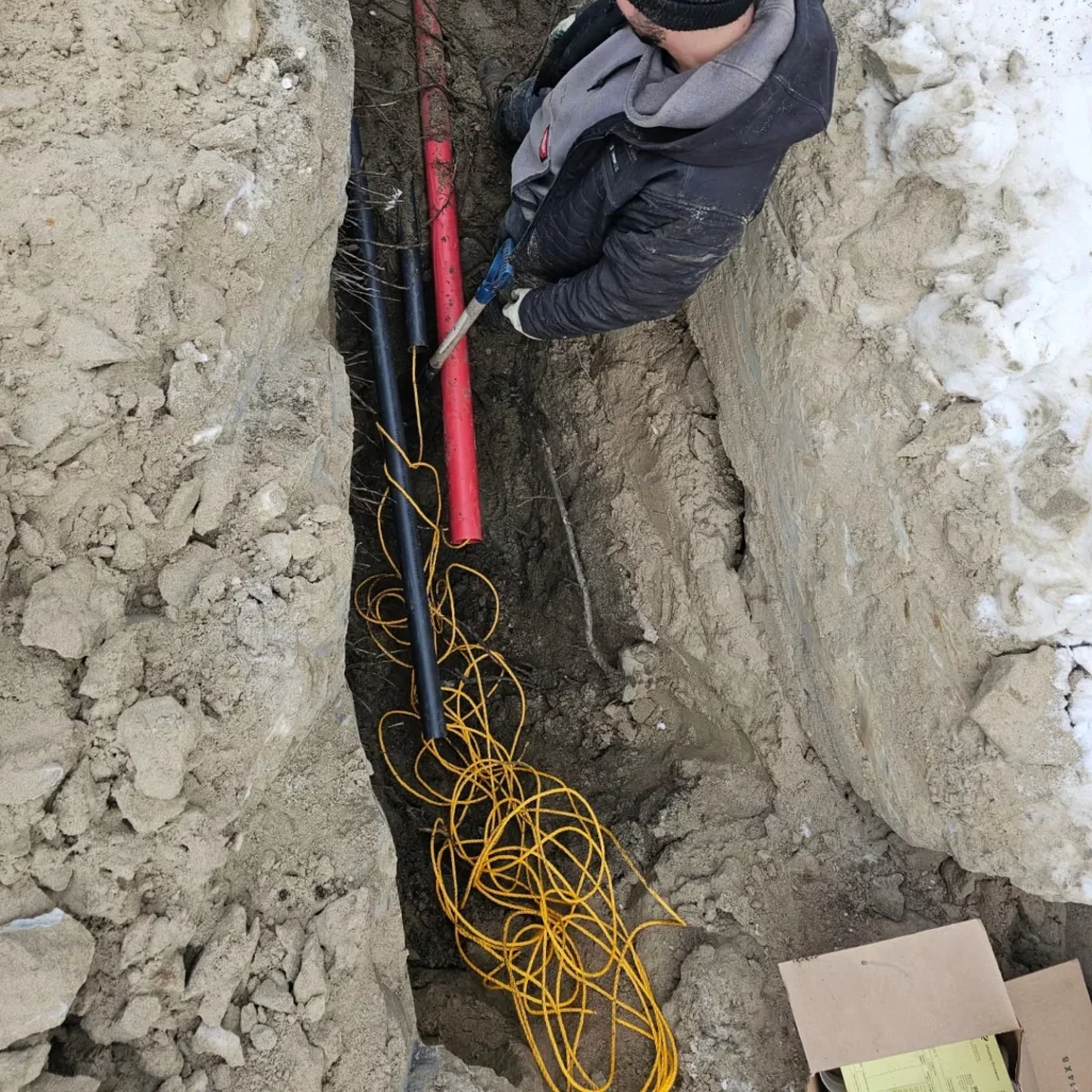 Underground service entrance cables laid in a trench for a luxury home in Blainville
