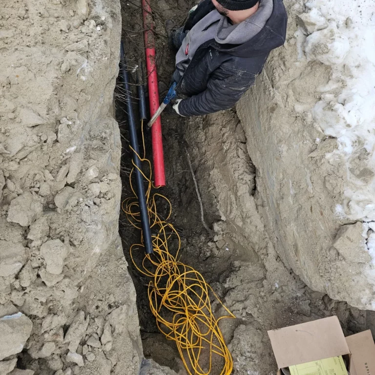 Underground service entrance cables laid in a trench for a luxury home in Blainville